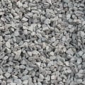 How does aggregate size affect cement content?