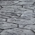 What is the difference between stamped concrete and concrete overlay?